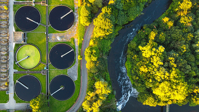 municipal wastewater treatment close to a river 640x360